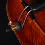 Professional double bass tailgut adjuster close-up, durable hardware for stable setup