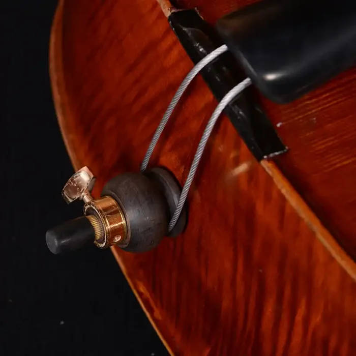 Professional double bass tailgut adjuster close-up, durable hardware for stable setup